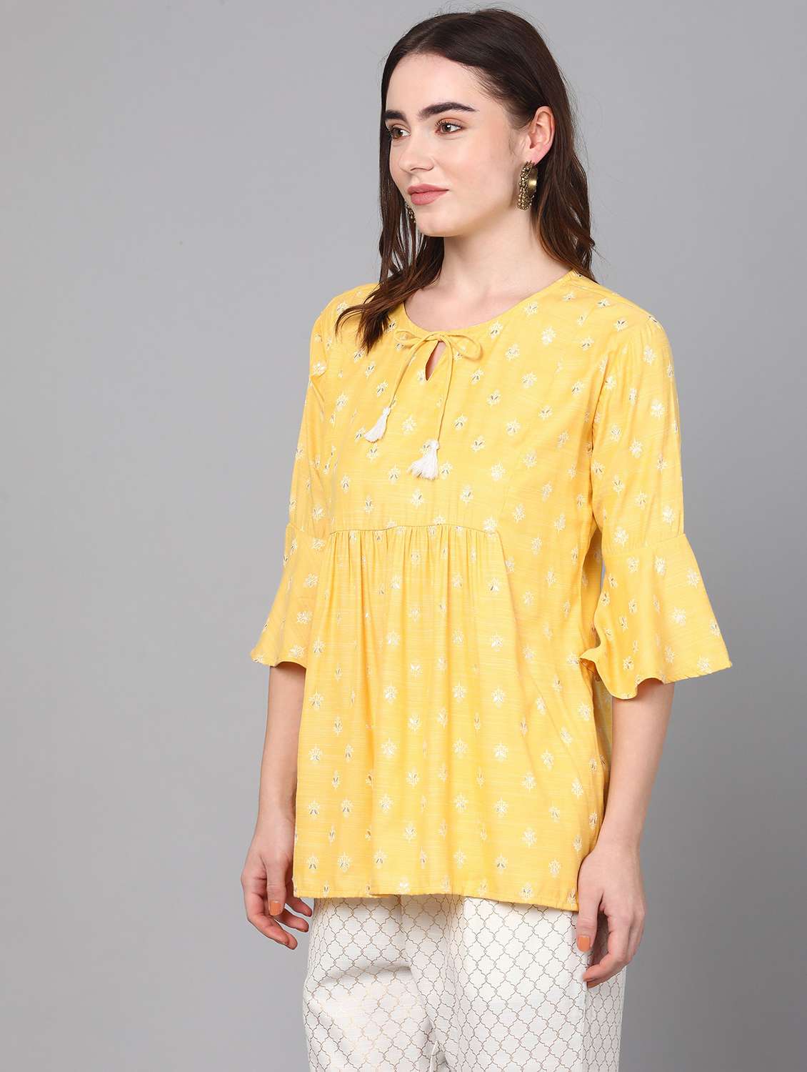yellow printed peplum top