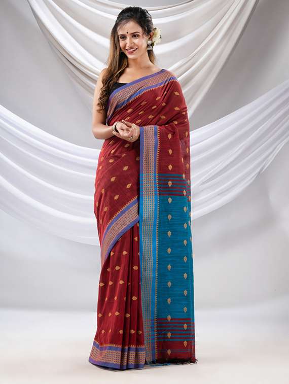 women's self design maroon colored saree with blouse