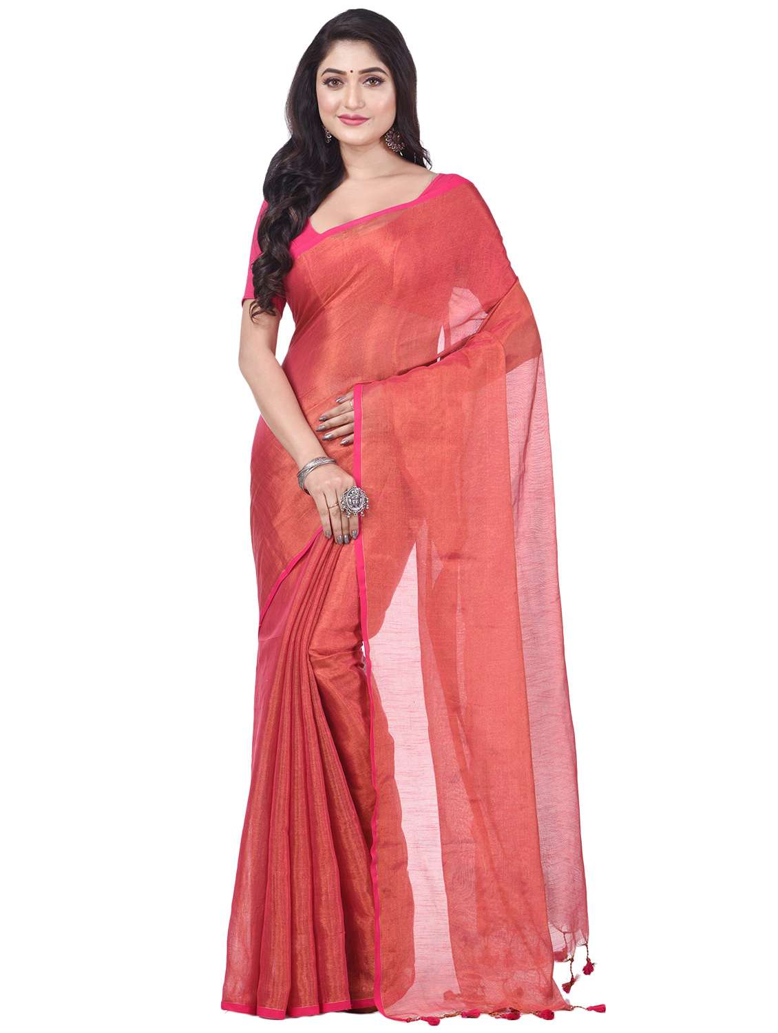 women's solid peach colored saree with blouse