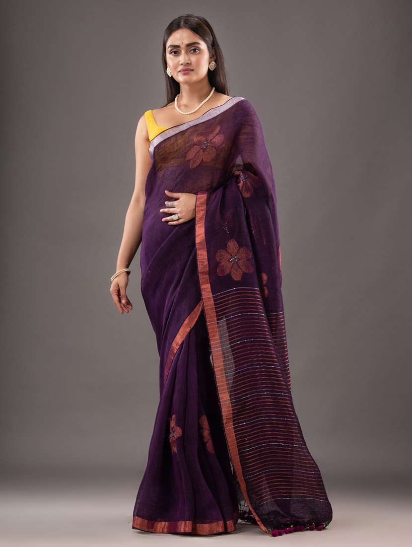women's self design purple colored saree
