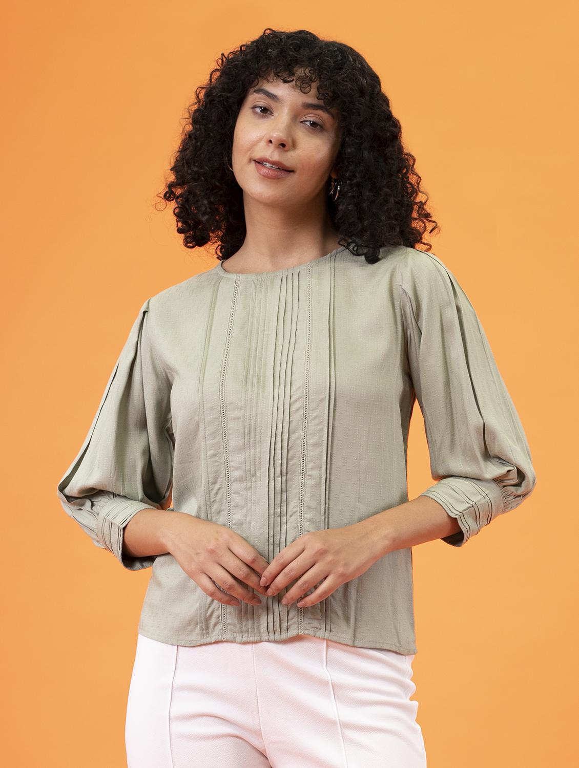 women green solid round neck regular top - 20277769 -  Zoom Image - 0