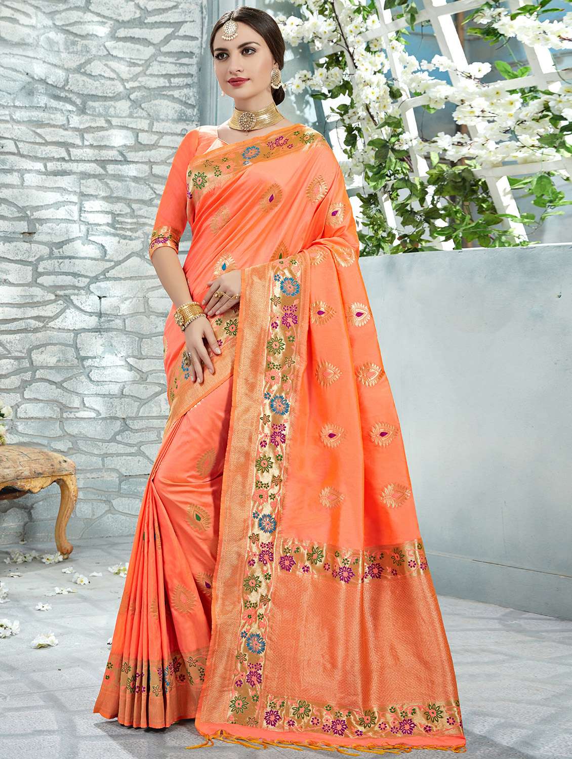 women's self design peach colored saree with blouse