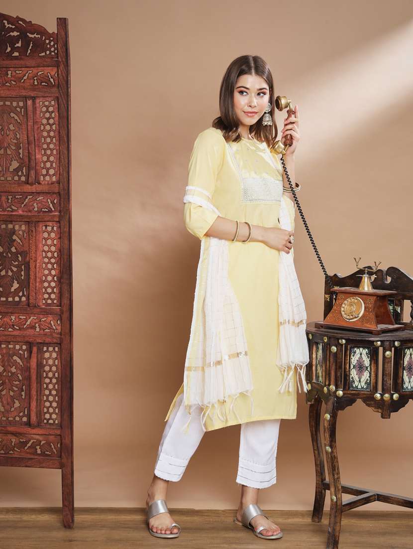cream colored kurta pant set