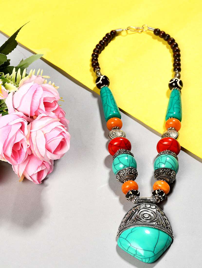 green metal long necklace
