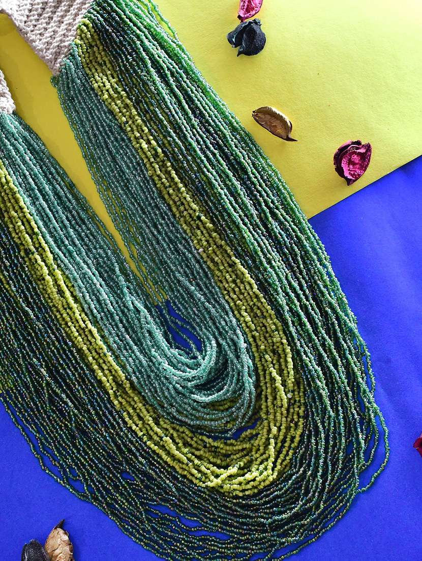 green metal long necklace