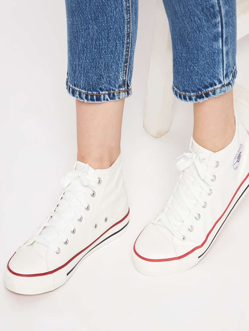 white canvas laceup sneakers - 20425643 -  Standard Image - 2