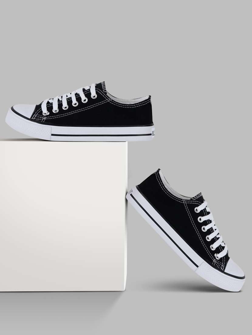 women solid black lace-up sneaker