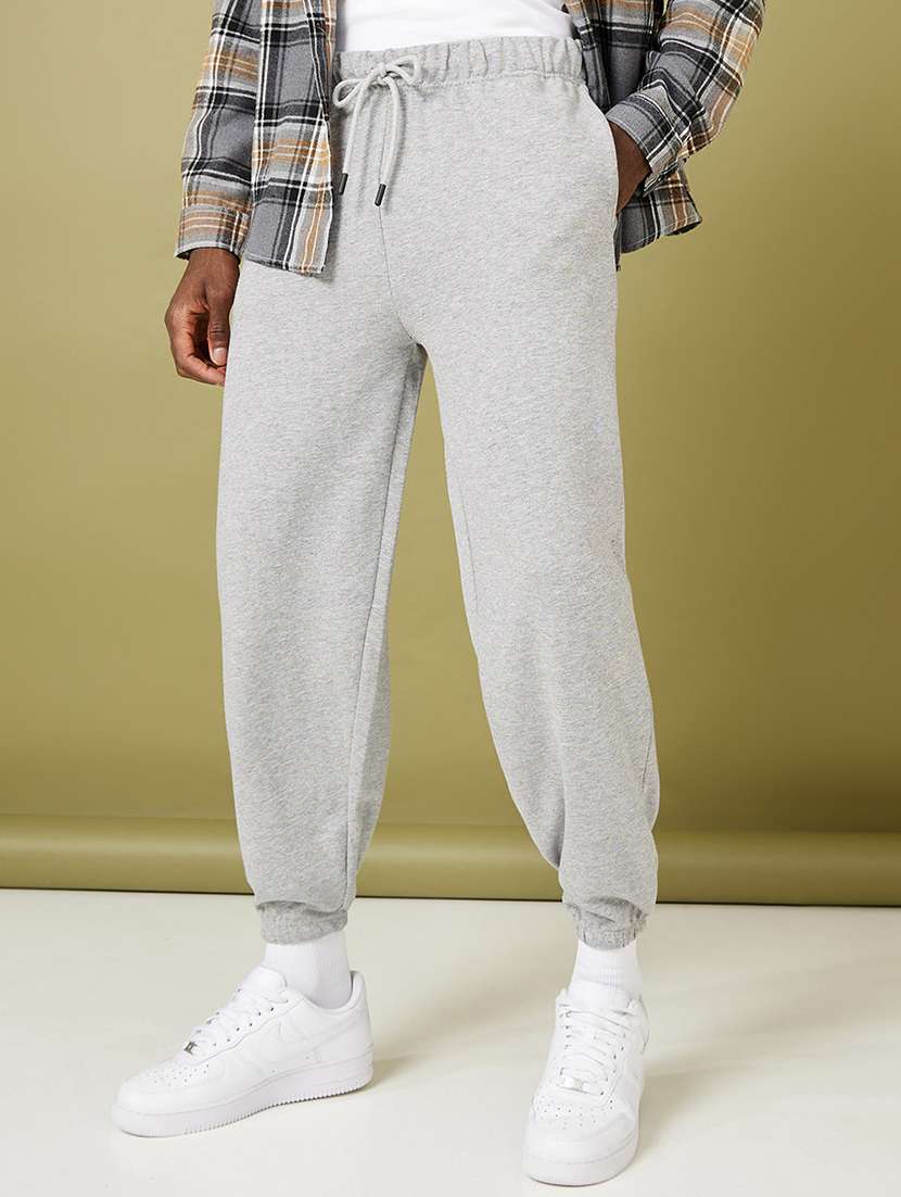 men grey solid mid rise jogger