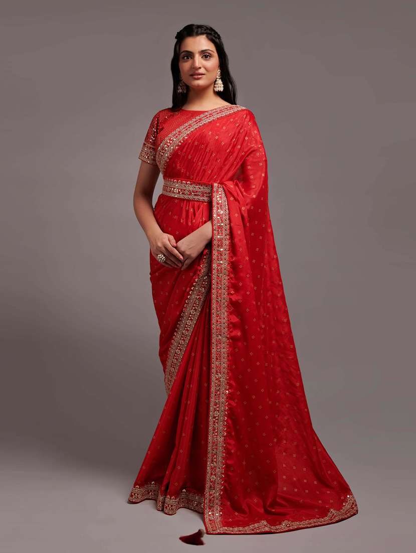 women's bordered red colored saree with blouse