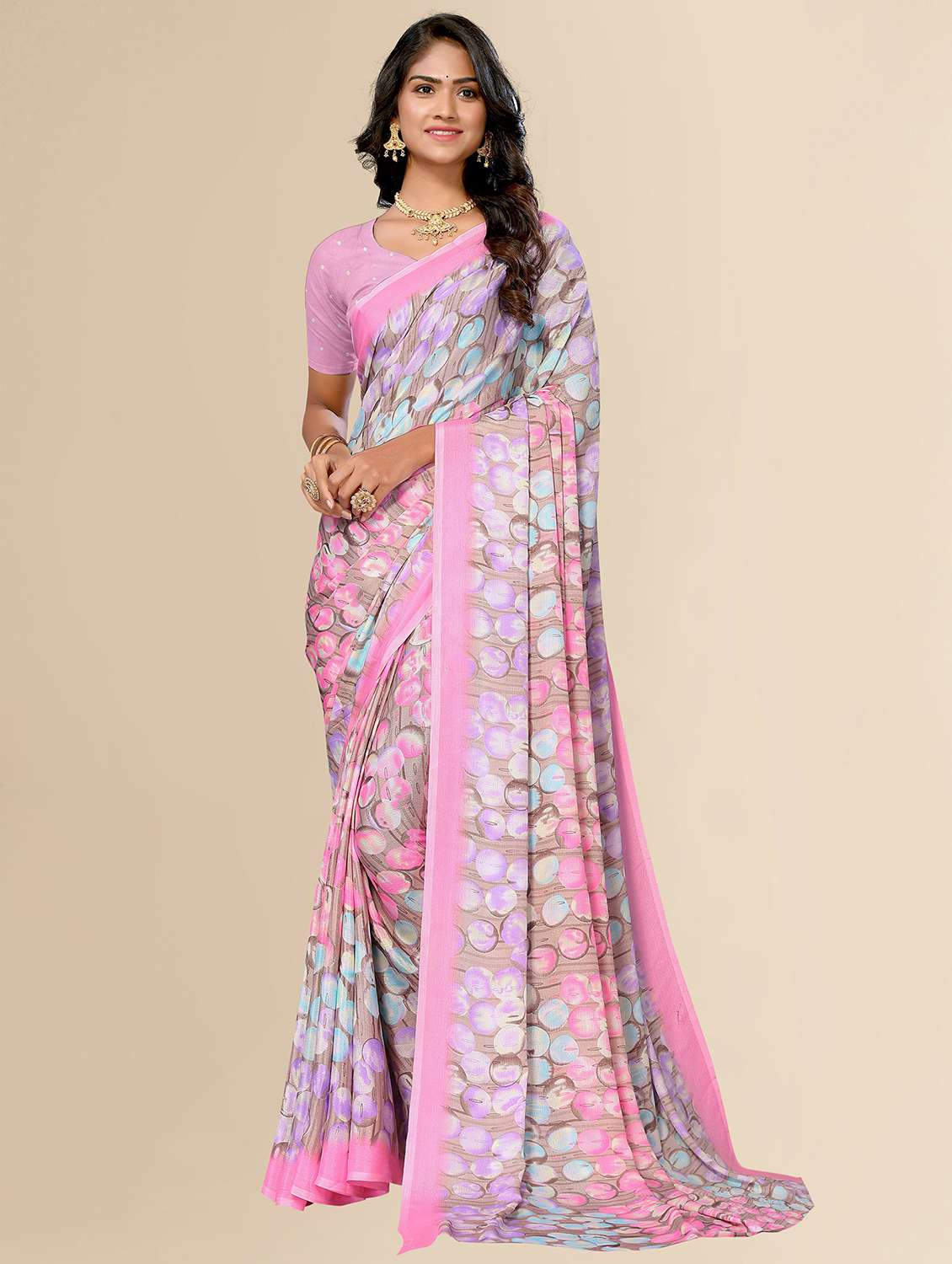 women pink geometric printed saree with blouse