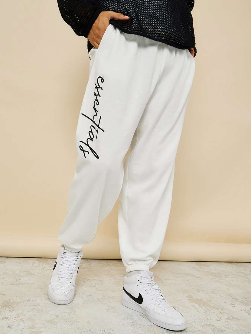 men white mid rise placement print jogger