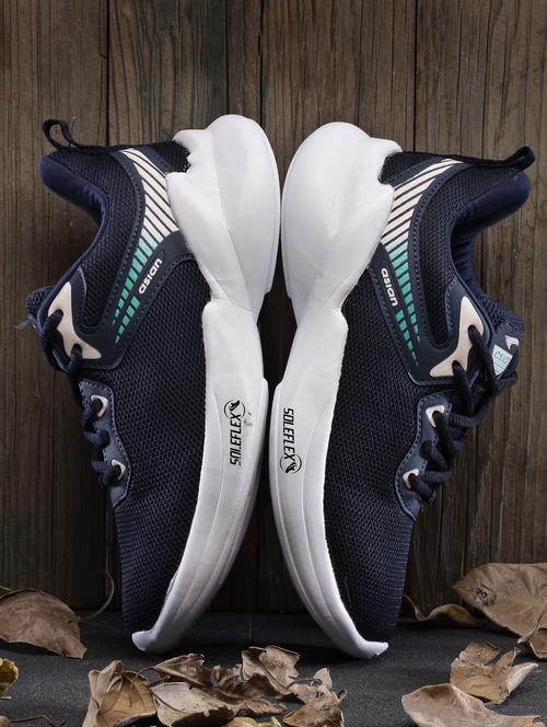 women running sports shoes - 20571915 -  Standard Image - 0