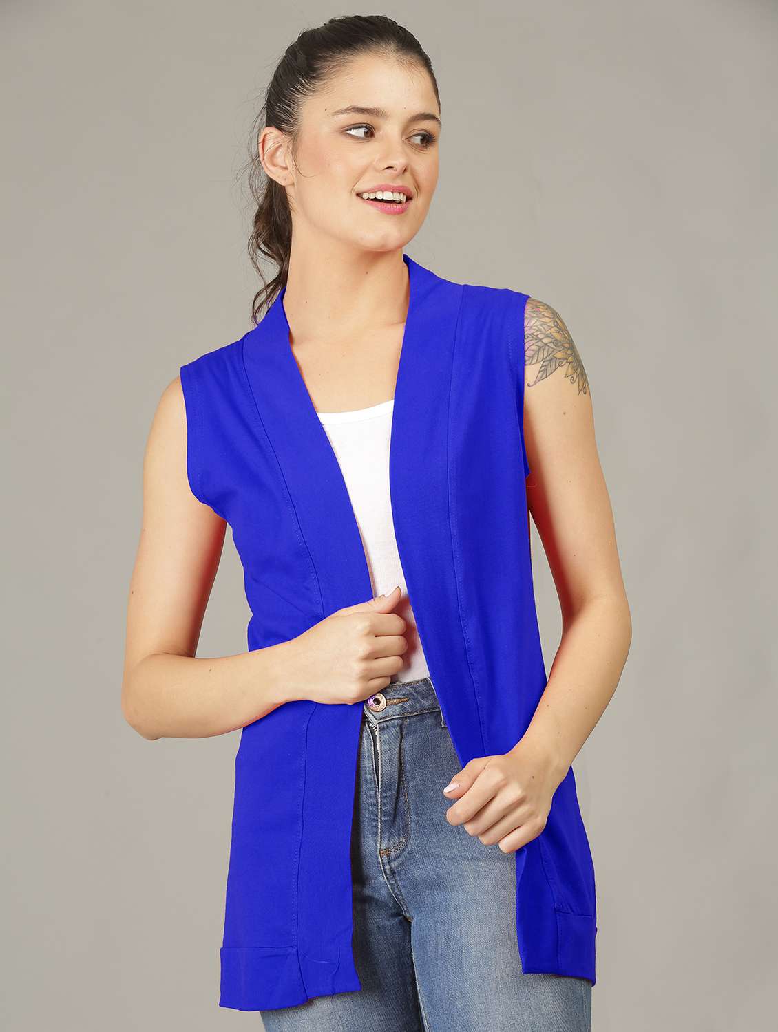 women solid sleeveless shrug 