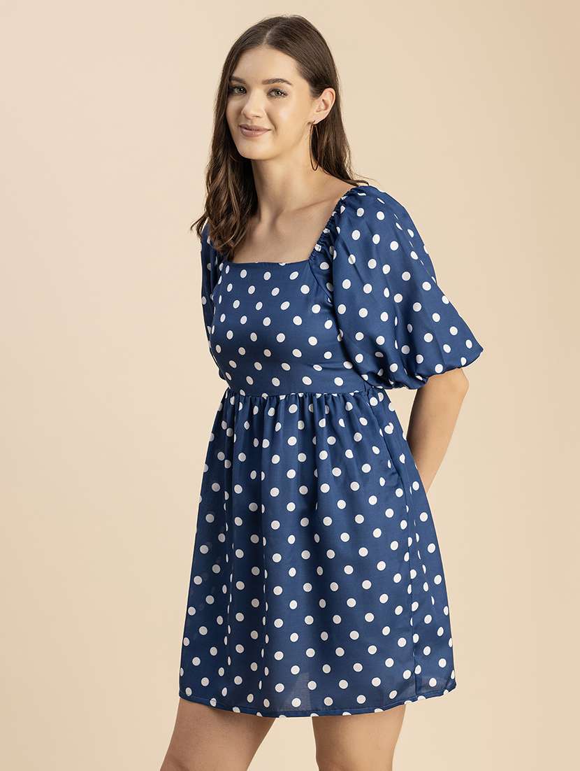 women polka doted puff sleeves dress - 20693958 -  Standard Image - 2