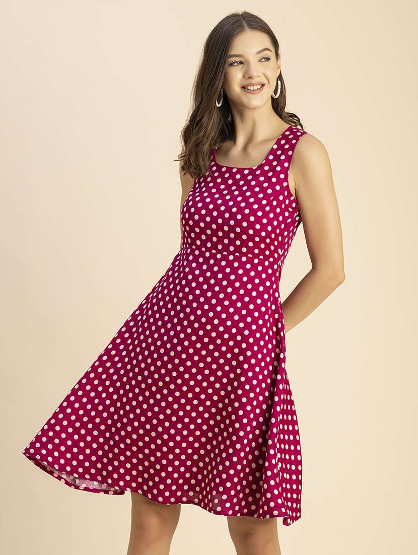 women polka doted sleeveless dress