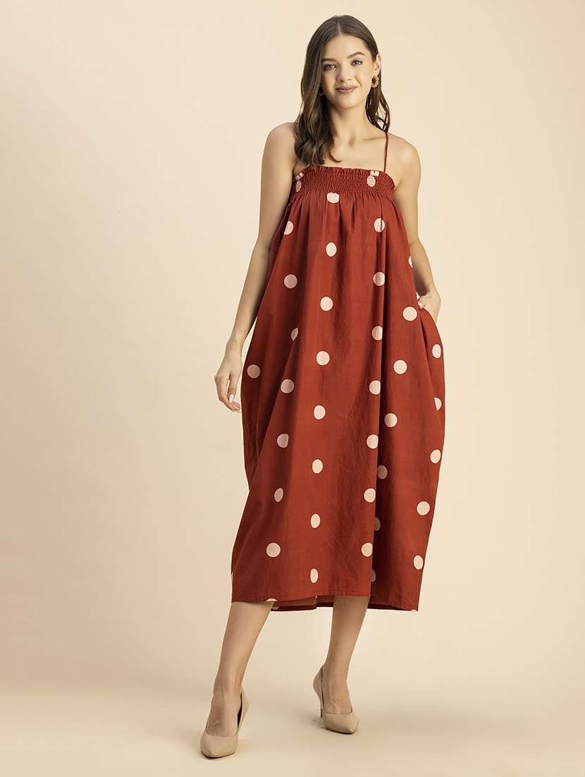 women polka doted shoulder strap dress