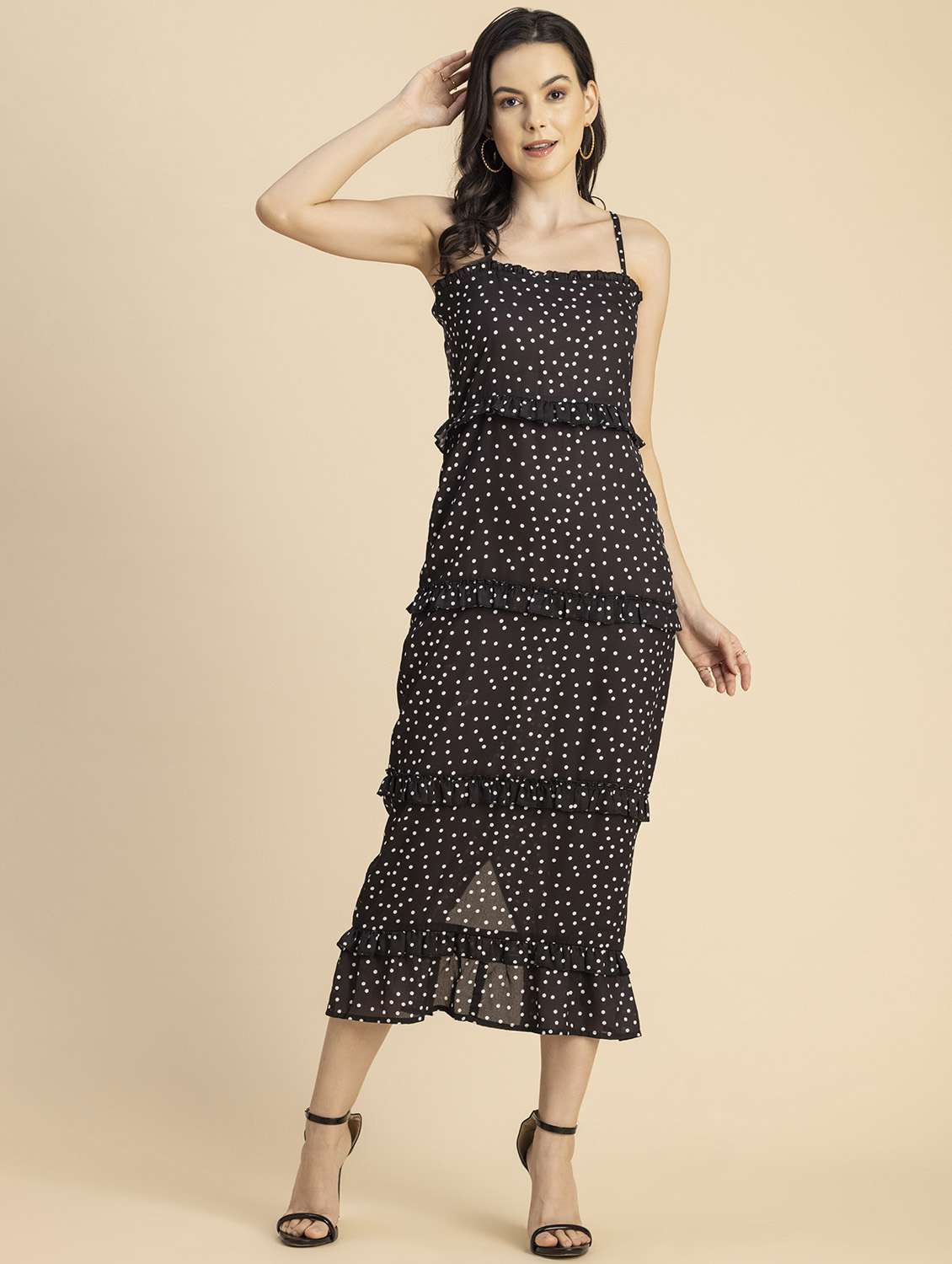 women polka doted sleeveless tiered dress
