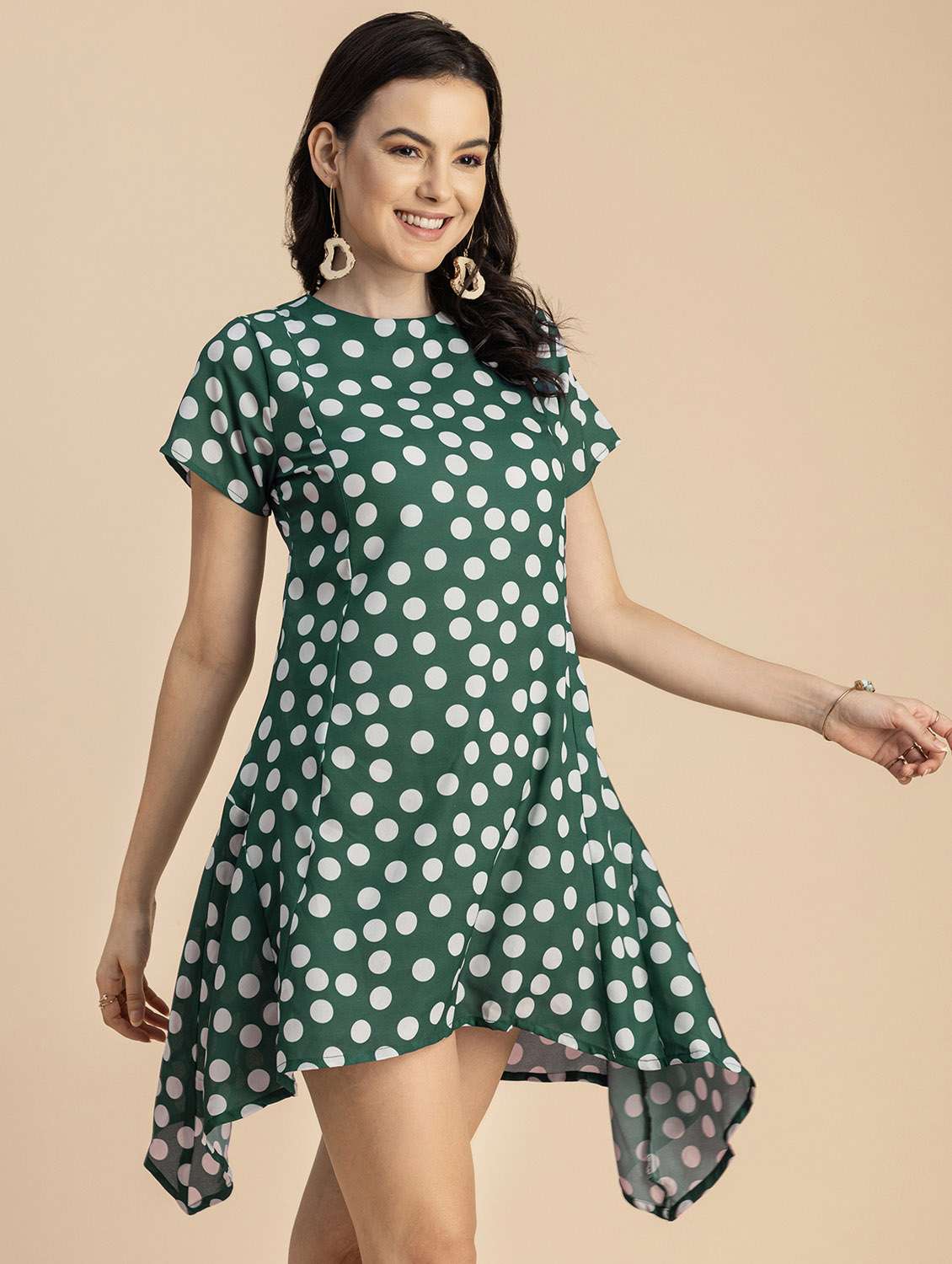 women polka doted asymmetric dress