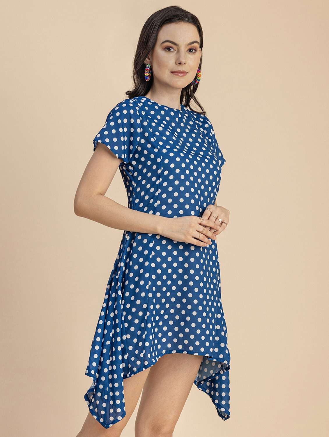 women polka doted asymmetric dress