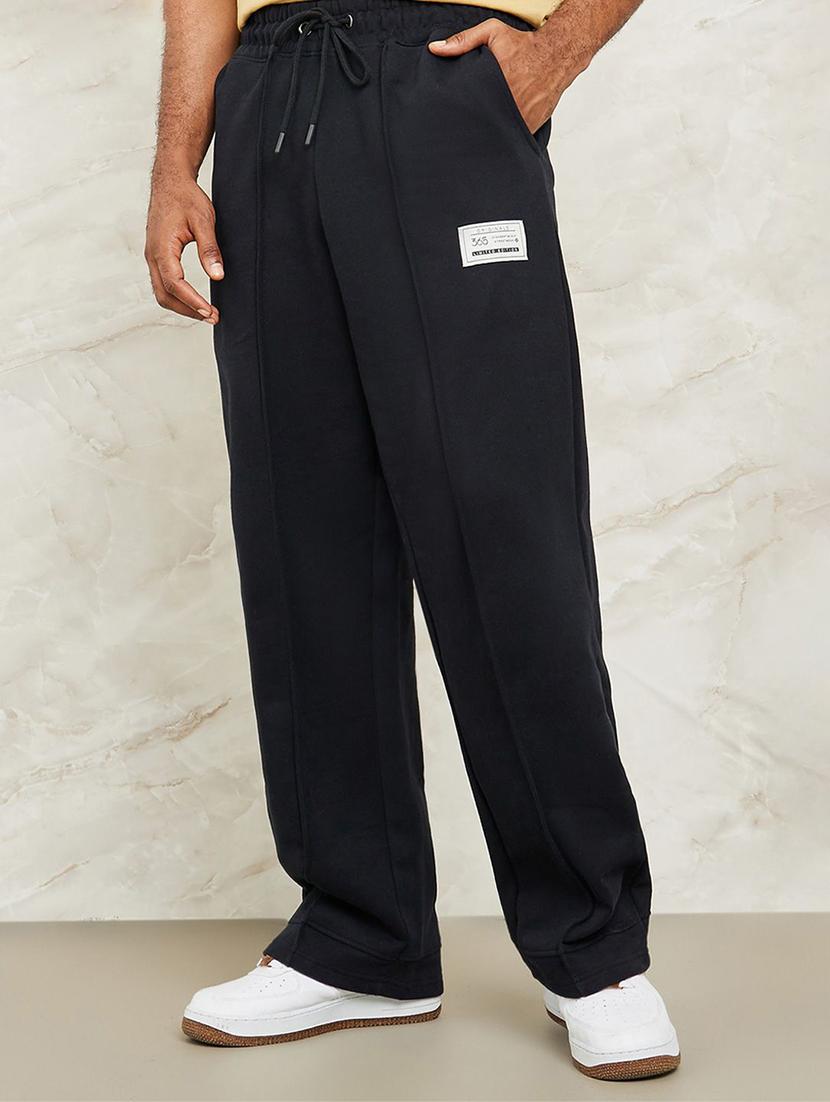 men loose fit placement print full length track pant - 20806382 - Standard Image - 2