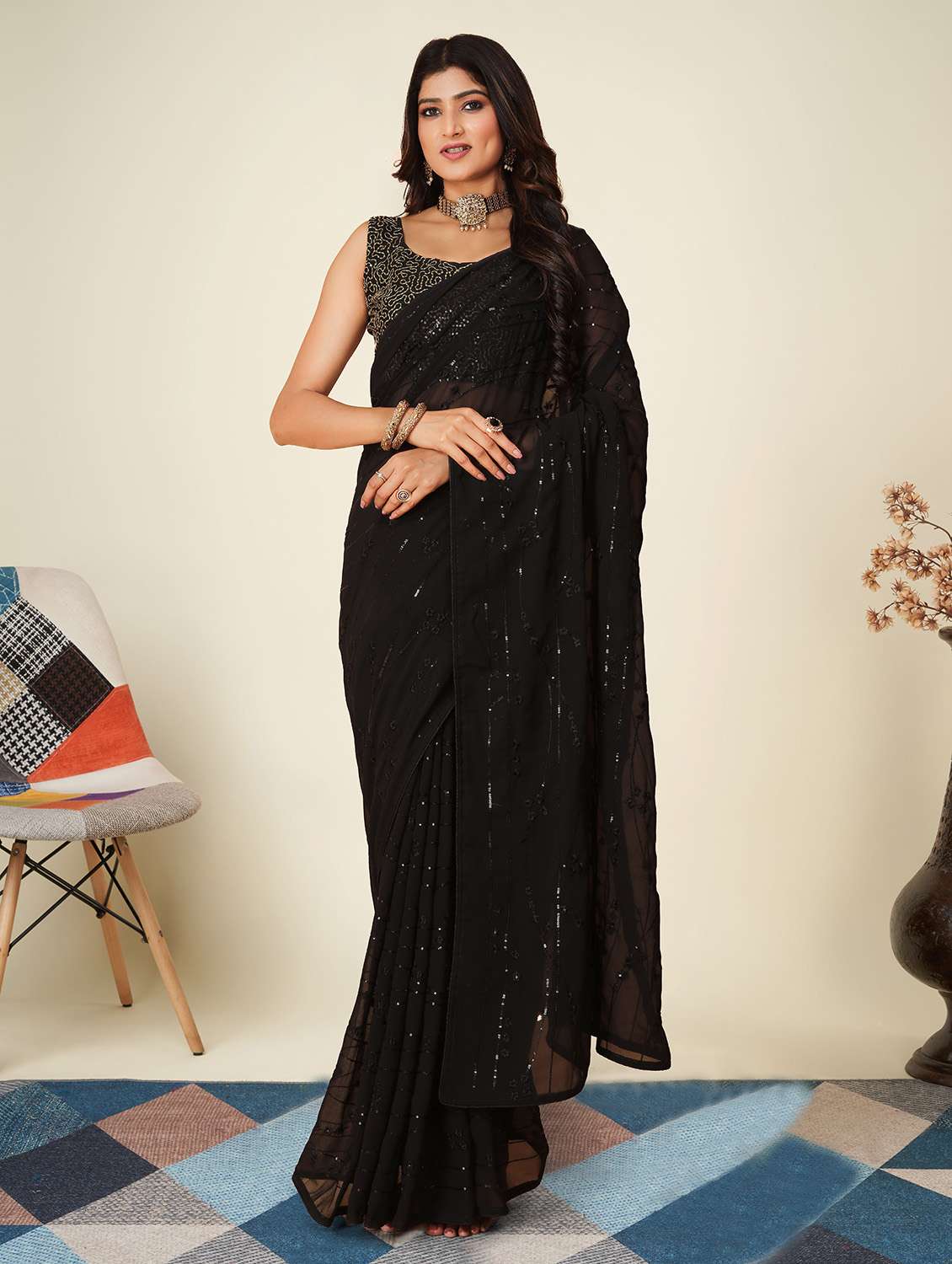 women black embroidered saree with blouse