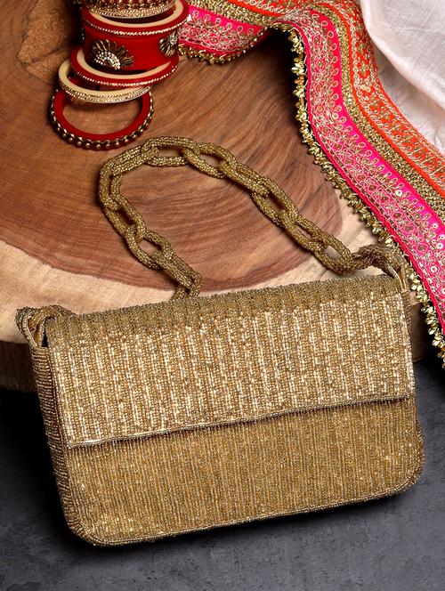gold faux silk fold over clutch - 20957992 -  Standard Image - 0
