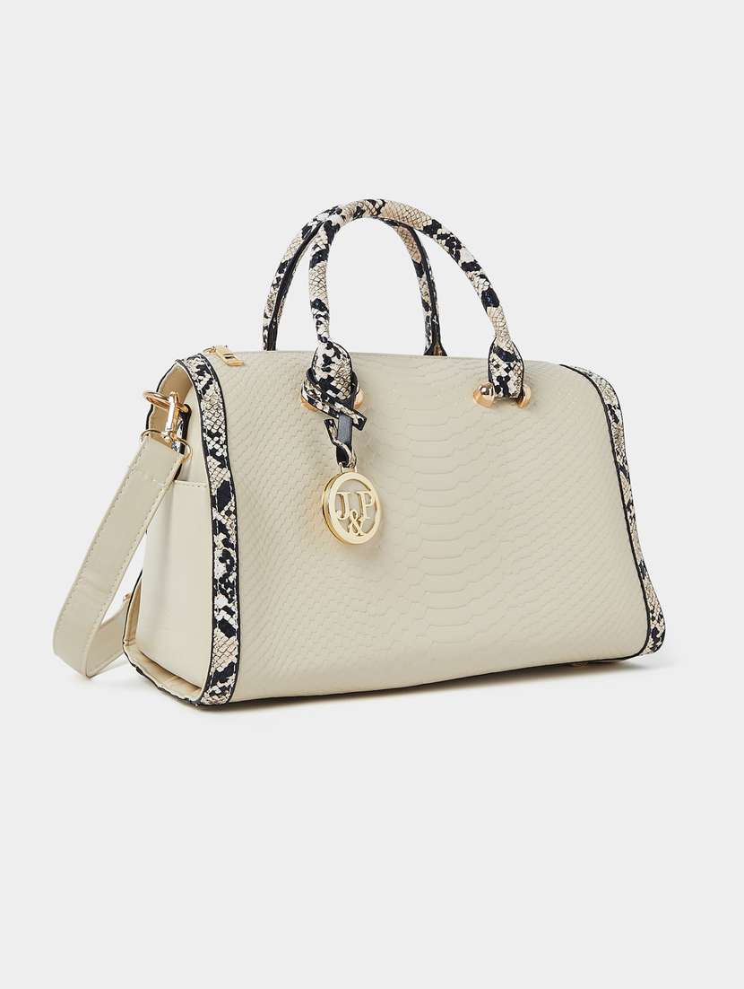 white textured handbag