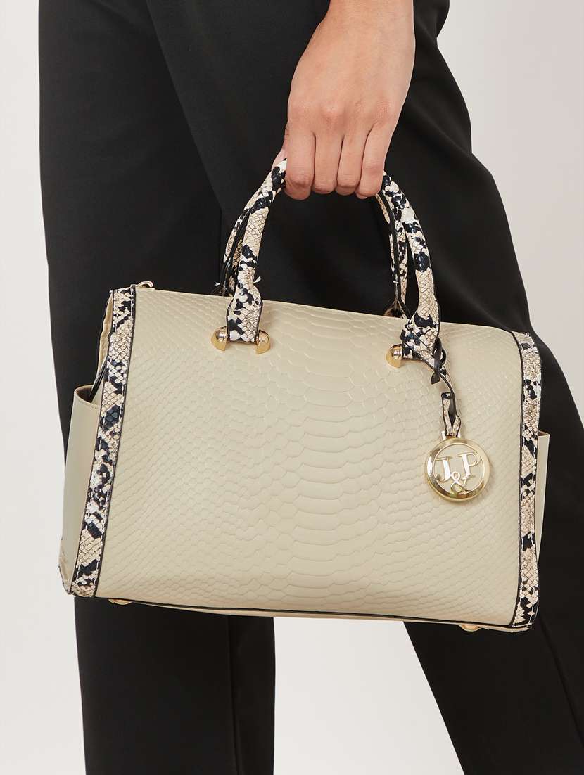white textured handbag - 20977373 -  Standard Image - 2