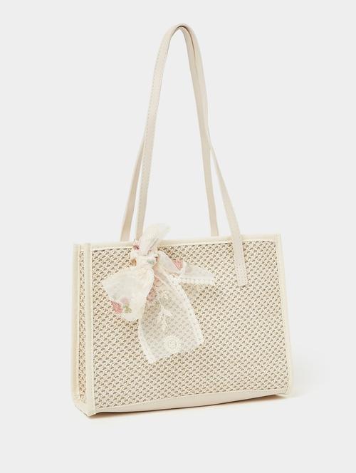 white textured handbag - 20977375 -  Standard Image - 0