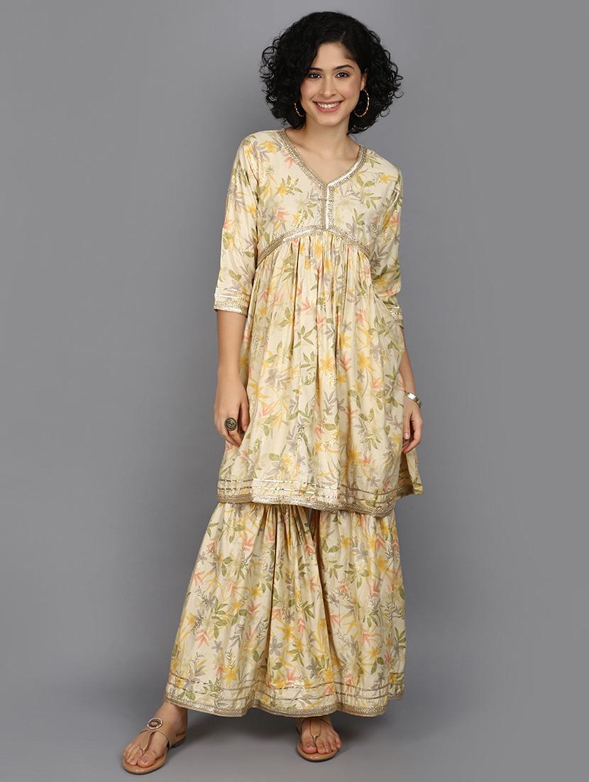 women yellow kurta sharara set with dupatta
