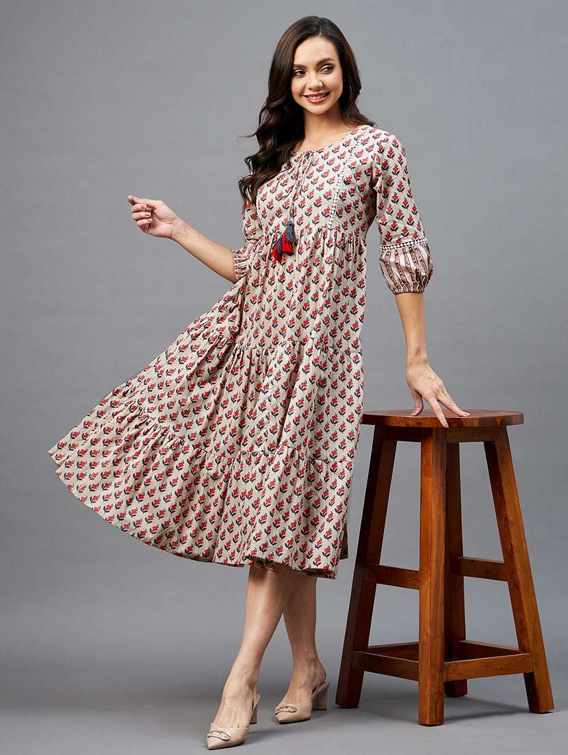 women cream floral printed tiered dress