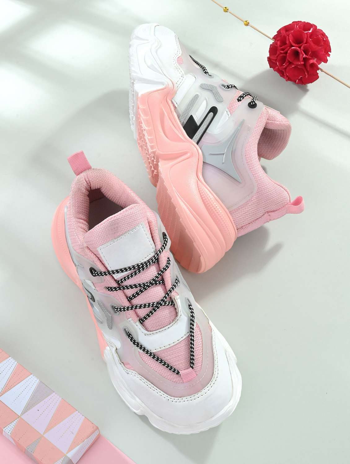 pink lace-up detailed sports shoes