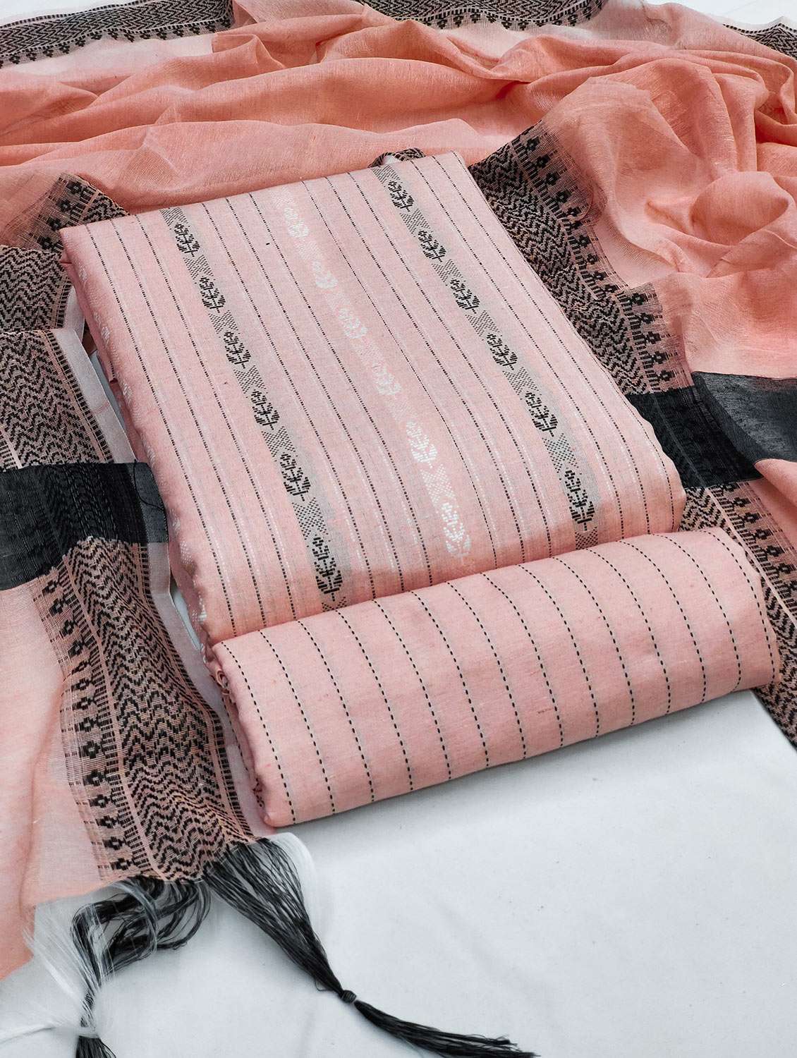 wome peach self design unstitched suit