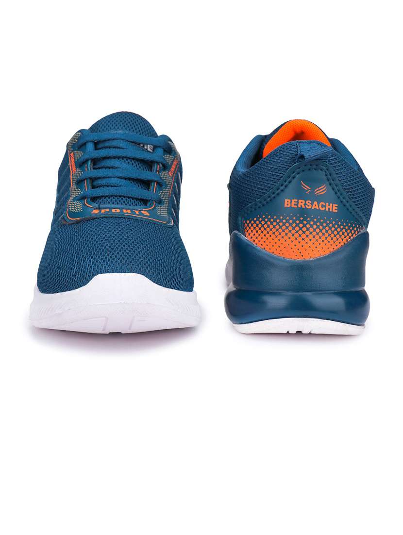 blue lace up sports shoes - 21143561 -  Standard Image - 2