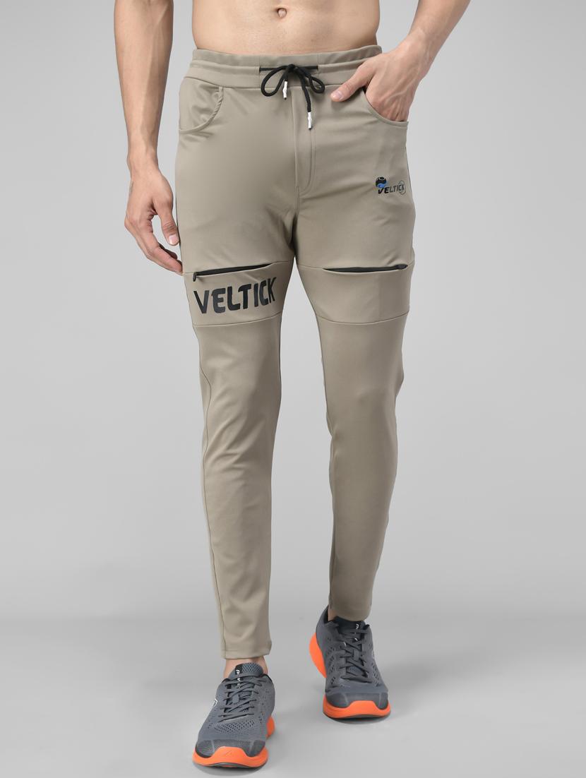 men placement print lycra ankle length track pant