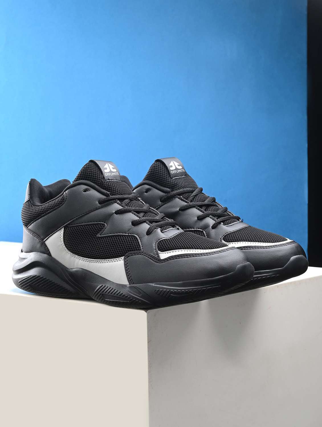 black synthetic & mesh laceup sports shoes