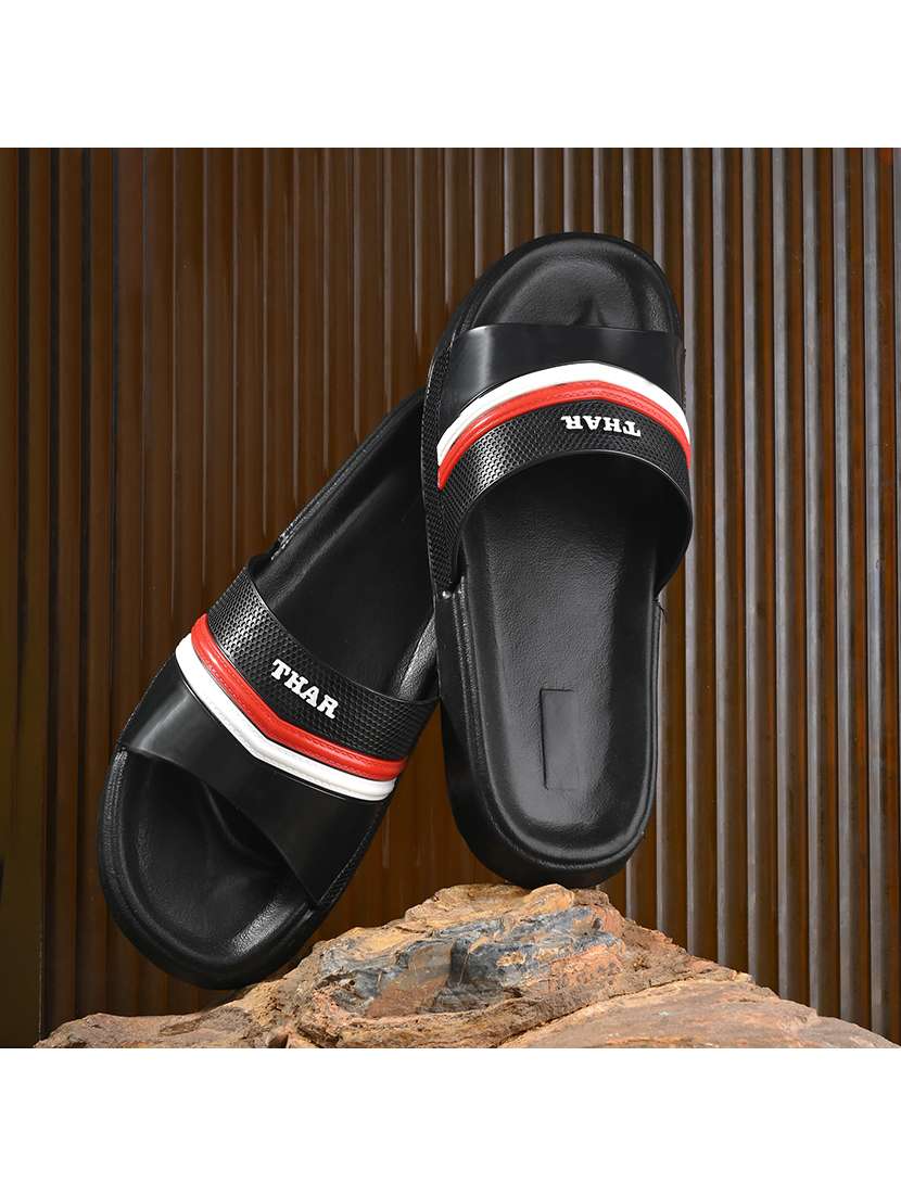 black synthetic slip on flip flops