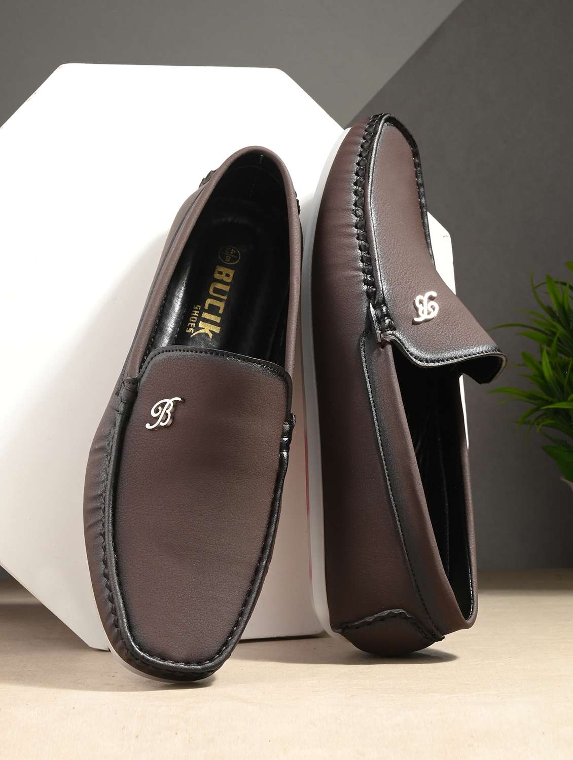 brown synthetic slip on loafers