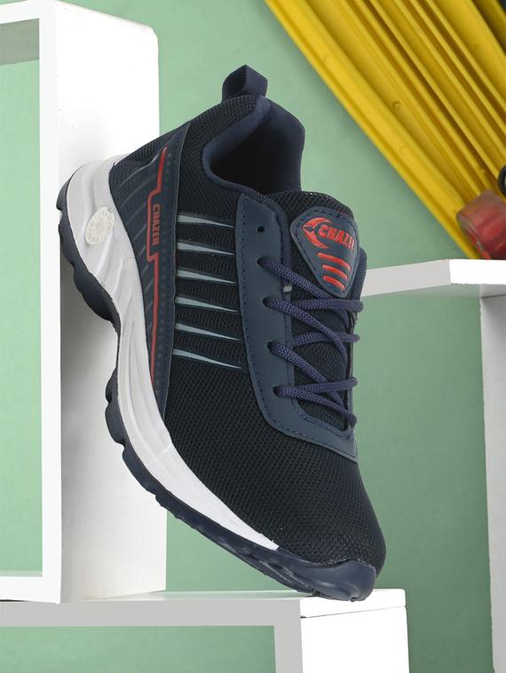 men lace up sports shoes