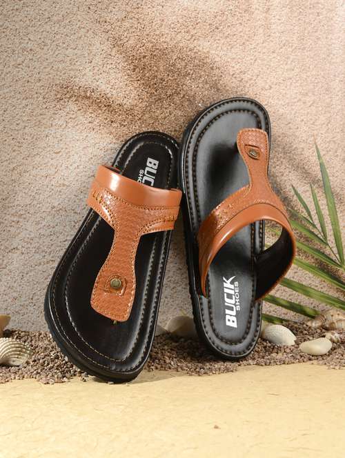 tan synthetic toe separator slippers