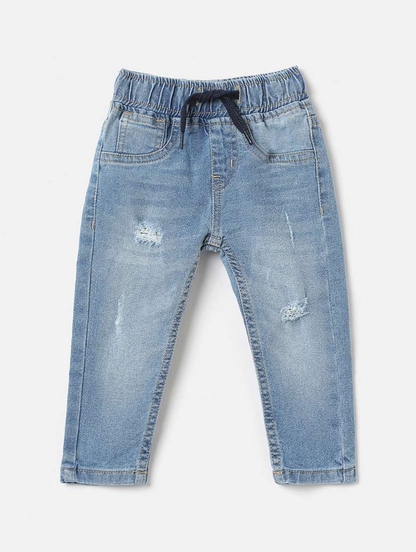light blue denim distressed jeans