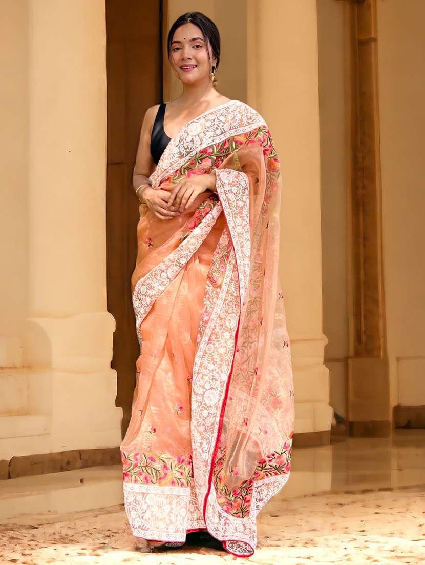 women peach embroidered saree with blouse