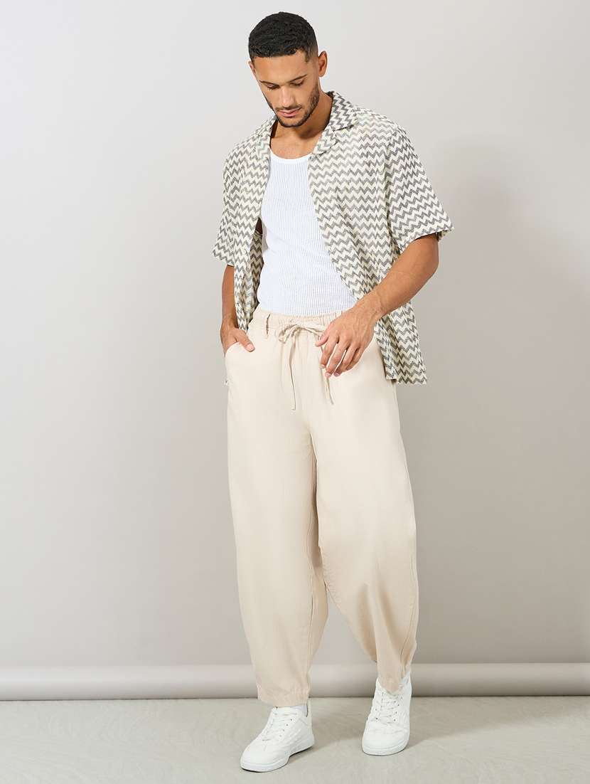 men cream solid joggers - 21307630 -  Standard Image - 2