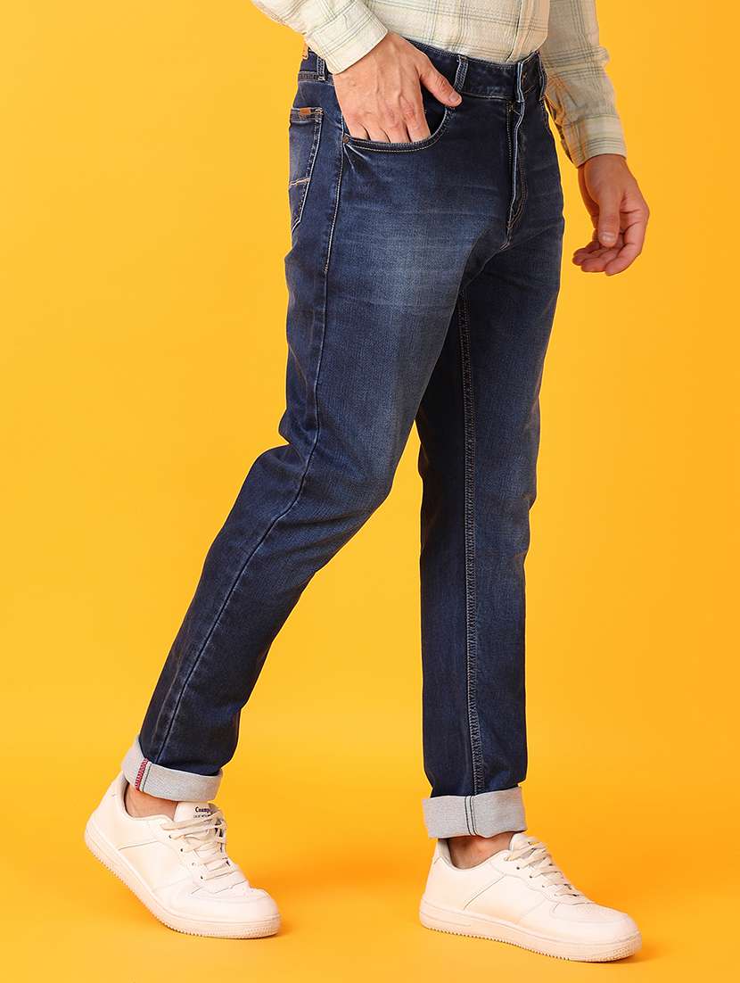 men blue plain jeans - 21328617 -  Standard Image - 2