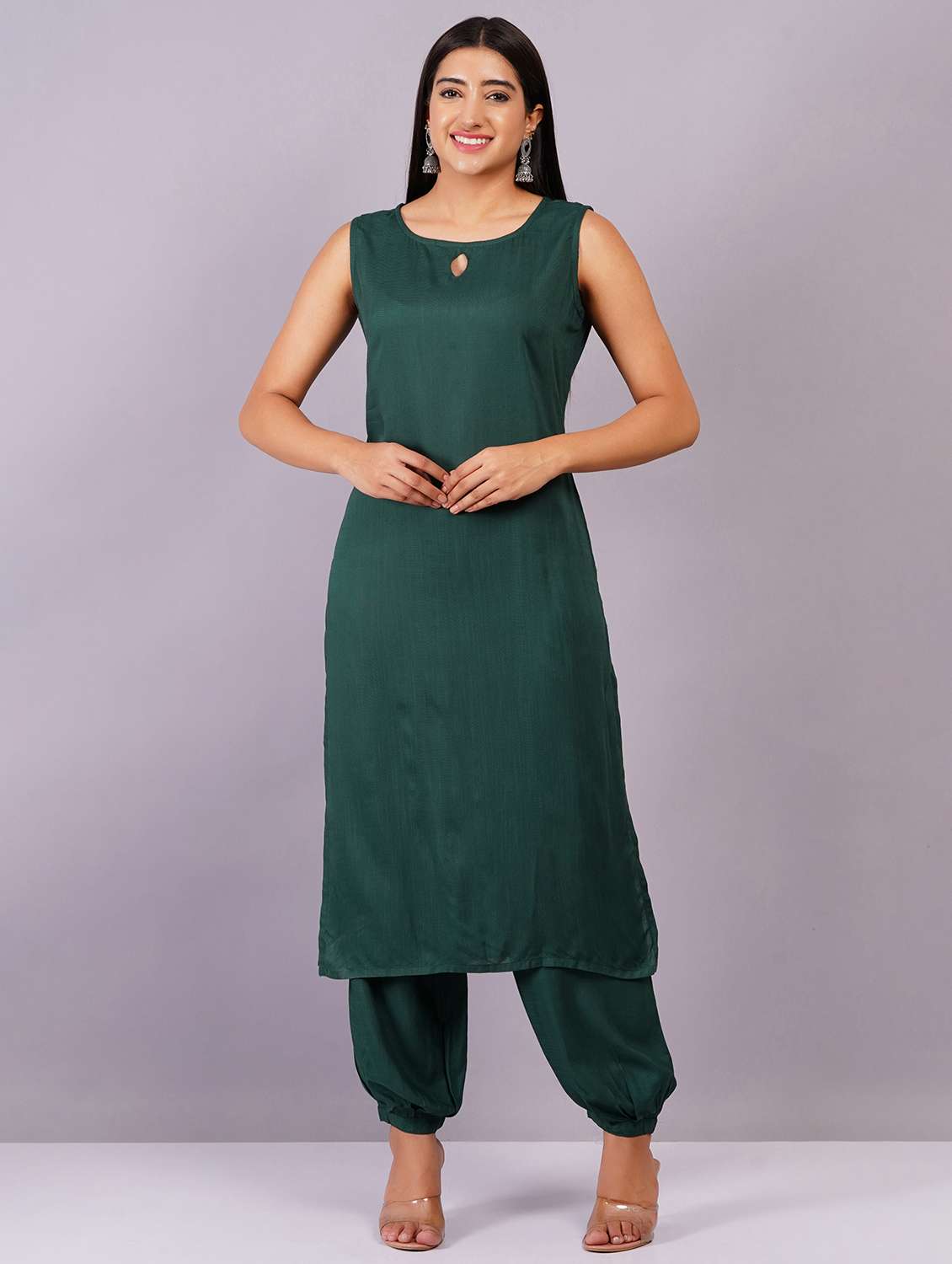 women solid sleeveless kurta salwar set
