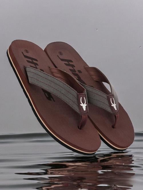 brown synthetic toe separator flip flops - 21356027 - Standard Image - 0