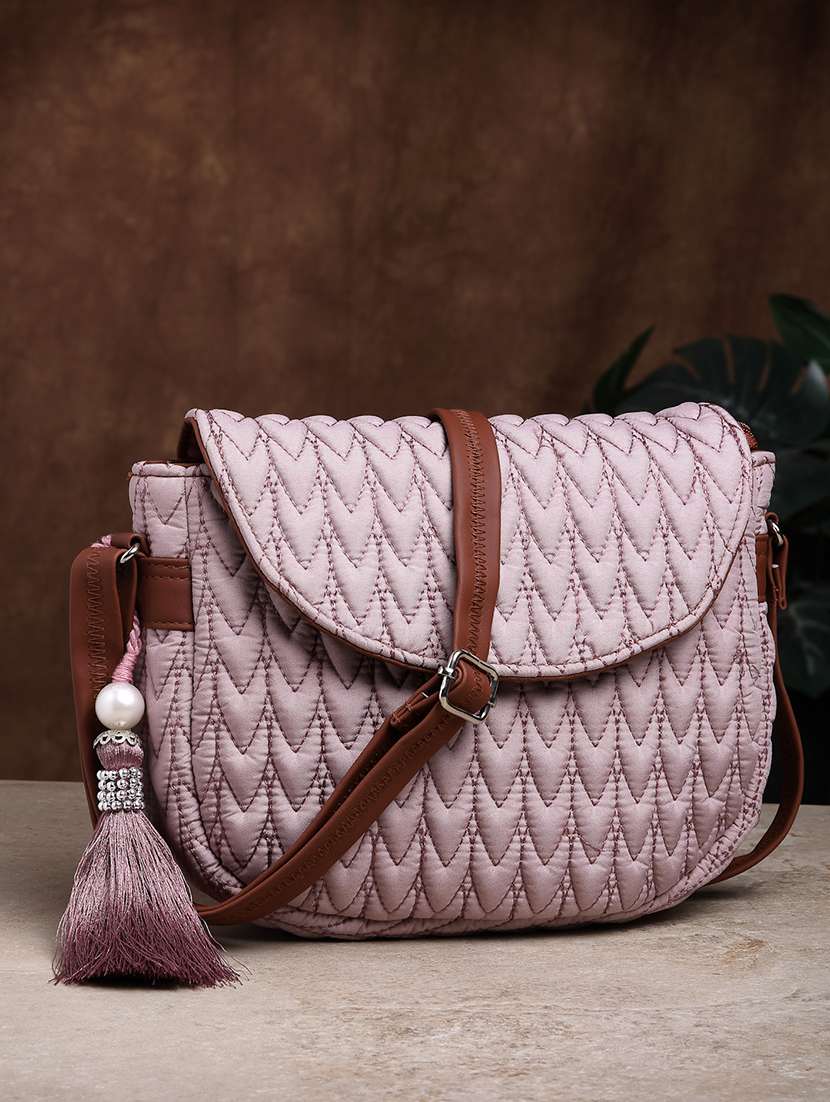 women textured sling bag