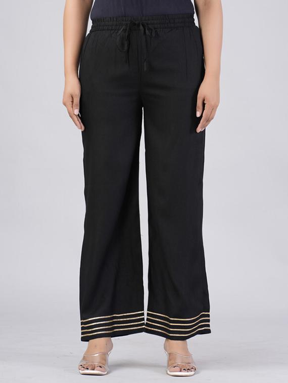 women solid gota detailed mid rise palazzo - 21393282 -  Zoom Image - 0