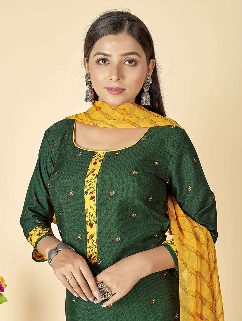 women green and yellow unstitched suit - 21447436 -  Standard Image - 2