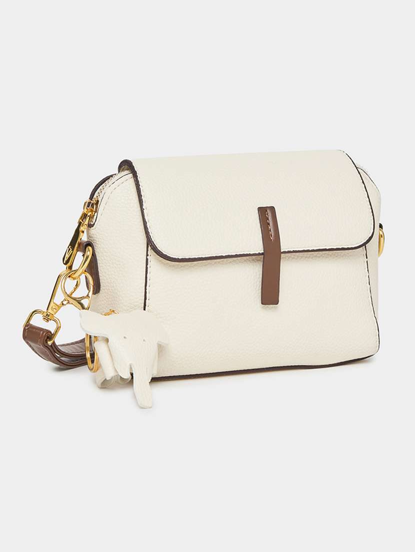 women cream pu handbag